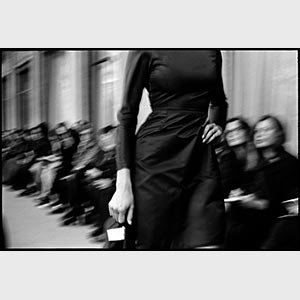 Black and white photograph of fashion show by French fashion designer Jerome L Huillier. Title: Jerome L Huillier-Noir