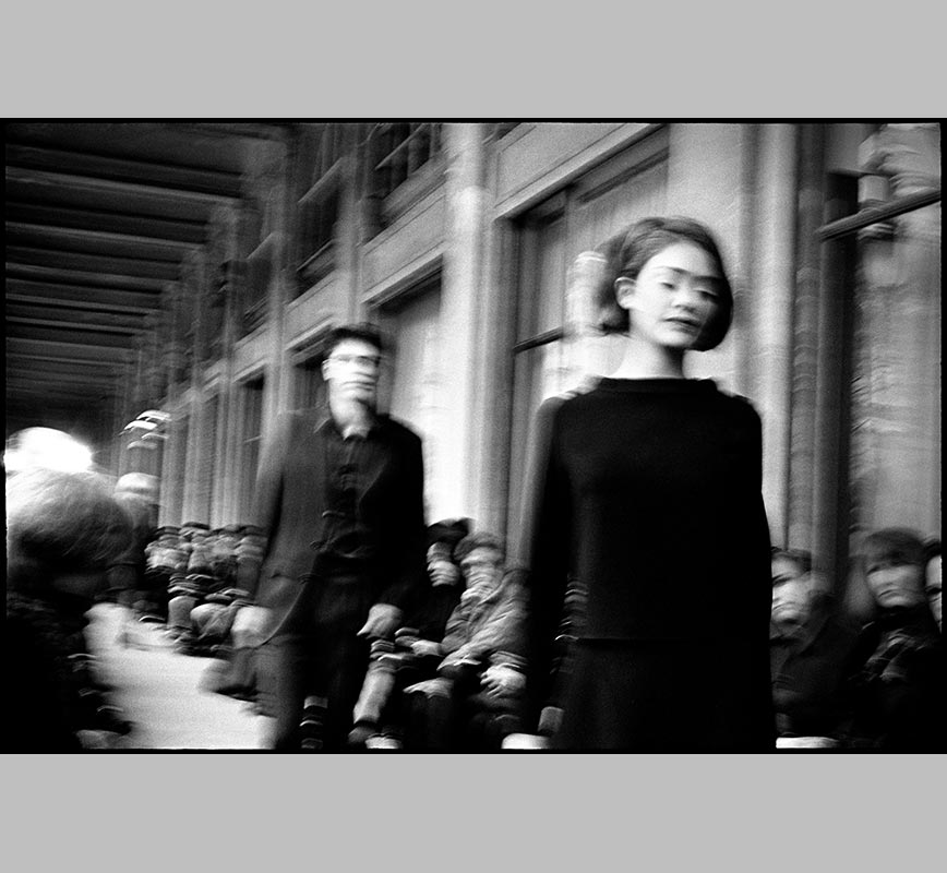 Black and white photograph of fashion show by French fashion designer Jerome L Huillier. Title: Jerome L Huillier - Palais Royal