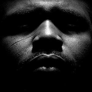 Black and white photographic portrait of a man. Title: Untitled #12