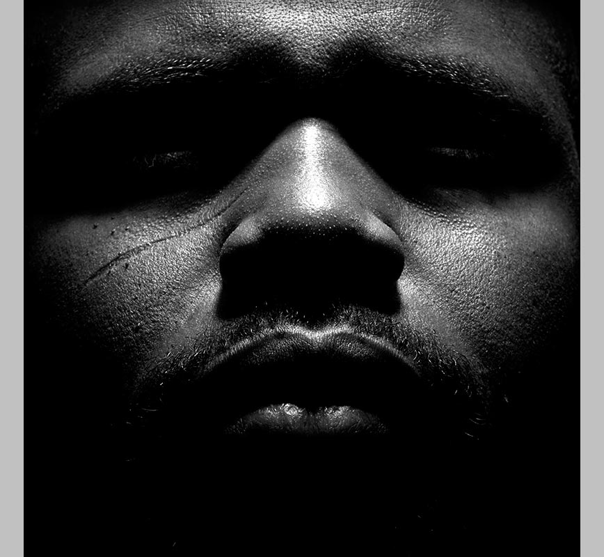 Black and white photographic portrait of a man. Title: Untitled #12