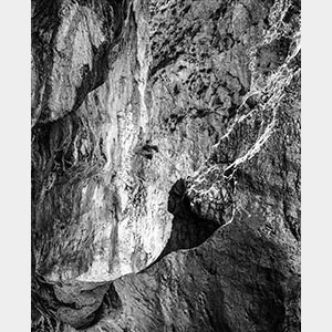 Black and white photograph of caves in the Greek island of Kithira inspired by the writings of the ancient Greek philosopher Heraclitus. Title: Homage to Heraclitus: Earth I