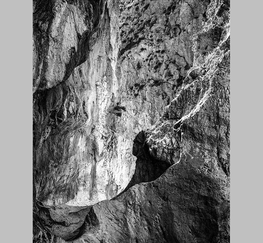 Black and white photograph of caves in the Greek island of Kithira inspired by the writings of the ancient Greek philosopher Heraclitus. Title: Homage to Heraclitus: Earth I