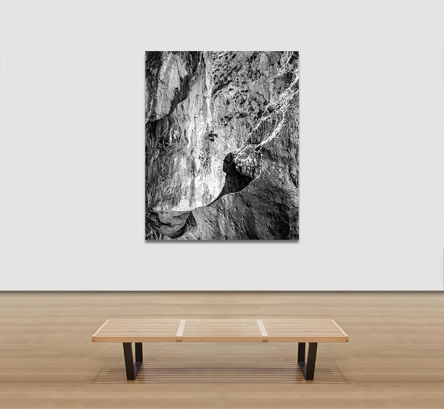 View in a Room of Black and white photograph of caves in the Greek island of Kithira inspired by the writings of the ancient Greek philosopher Heraclitus. Title: Homage to Heraclitus: Earth I