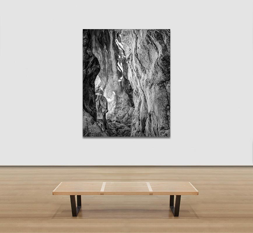 View in a Room of Black and white photograph of caves in the Greek island of Kithira inspired by the writings of the ancient Greek philosopher Heraclitus. Title: Homage to Heraclitus: Earth II