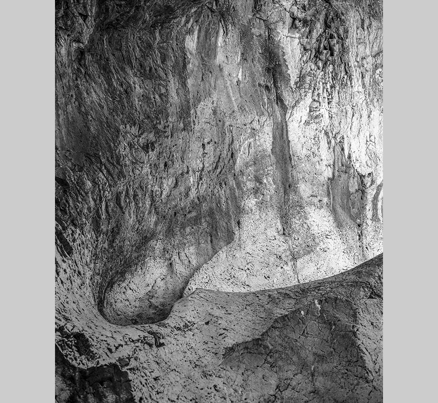 Black and white photograph of caves in the Greek island of Kithira inspired by the writings of the ancient Greek philosopher Heraclitus. Title: Homage to Heraclitus: Earth VII