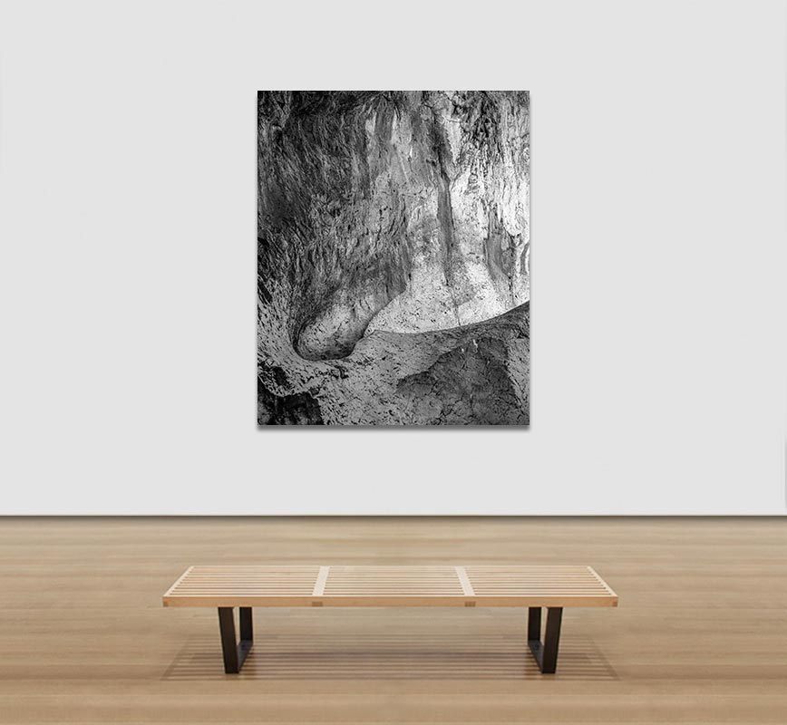 View in a Room of Black and white photograph of caves in the Greek island of Kithira inspired by the writings of the ancient Greek philosopher Heraclitus. Title: Homage to Heraclitus: Earth VII