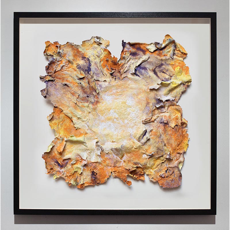 Framed abstract textural work on paper. Mainly yellow and orange colors. Title: Estate Lux
