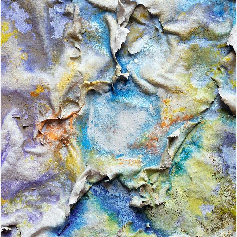 Detail of an abstract textural work on paper. Mainly yellow and blue colors. Title: Aequinoctium Vernum
