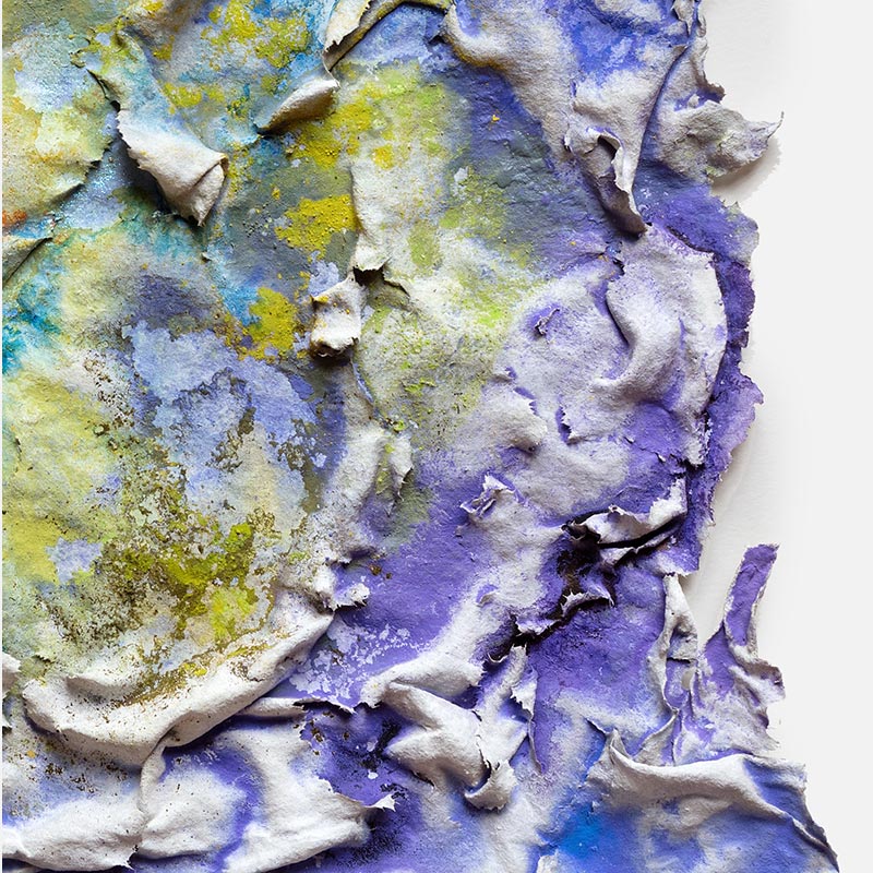 Detail of an abstract textural work on paper. Mainly yellow and blue colors. Title: Aequinoctium Vernum