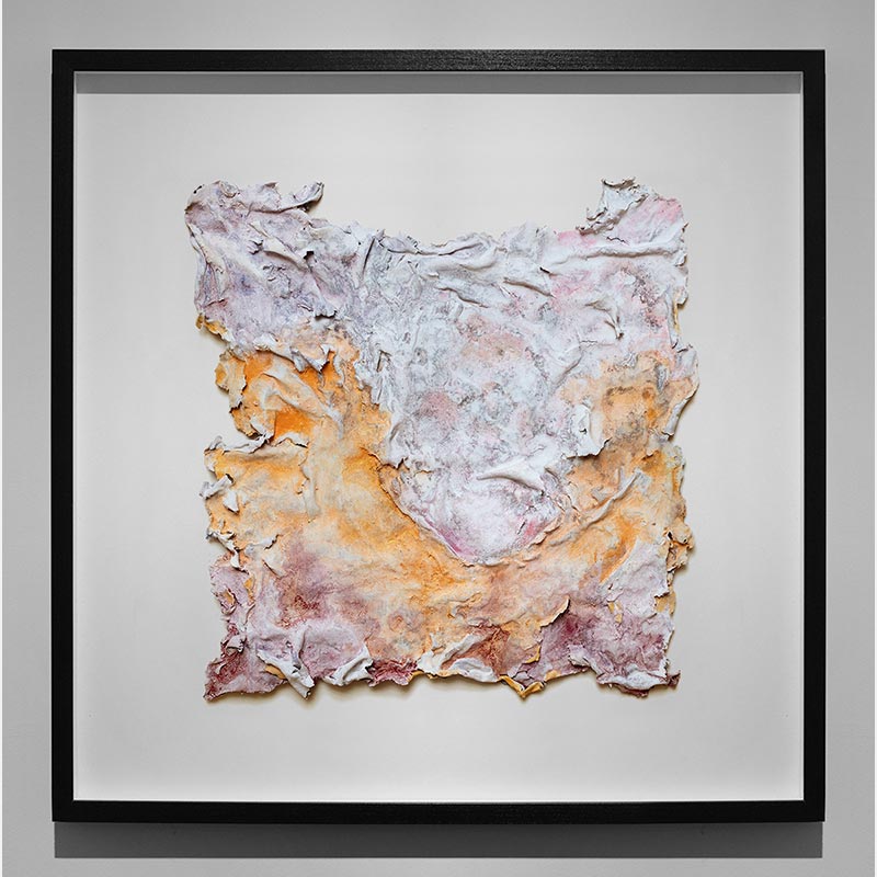 Framed abstract textural work on paper. Mainly orange, rose, and white colors. Title: Haeream Vallem