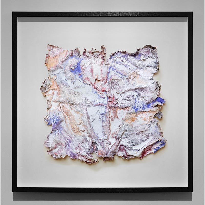 Framed abstract textural work on paper. Mainly blue, rose, and white colors. Title: Cineres Pompei