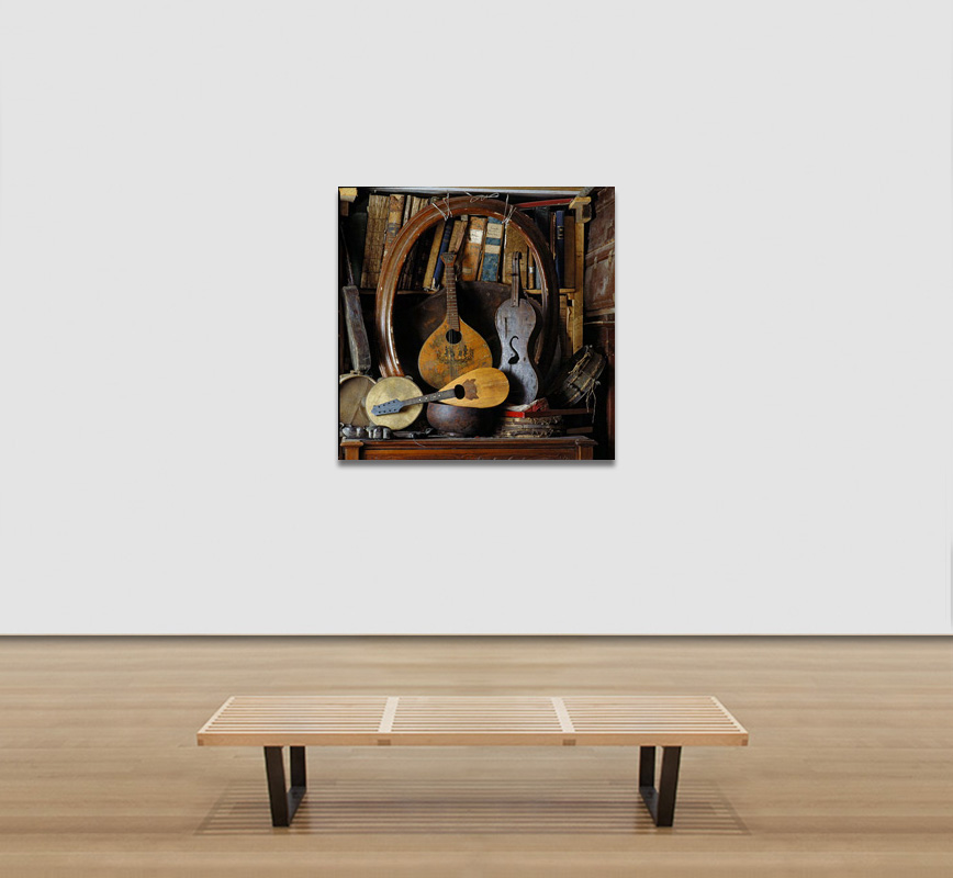 View in a room of a Color Photograph of musical instruments at the Museo Ettore Guatelli, Ozzano Taro Collecchio, Parma, Italy. Limited edition print. Title: Still Life with Musical Instruments