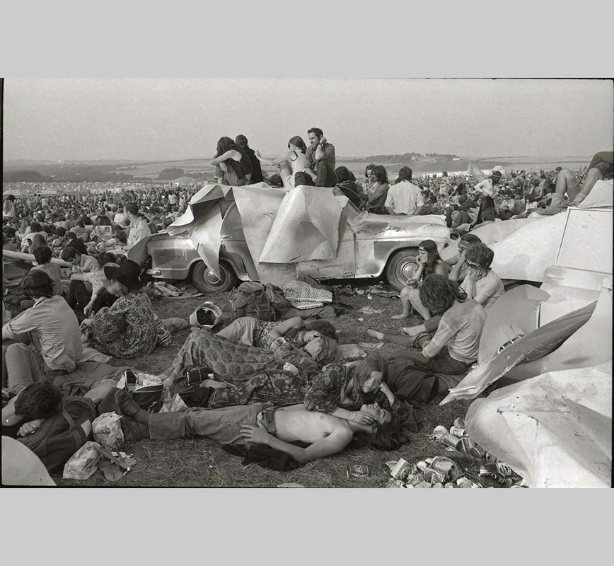 Black and white photograph of hippies camping out during the Isle of Wight 1970 Festival. Limited edition print. Title: Hippies at the Isle of Wight 1970 Festival
