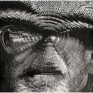 Black and white photograph of a man with a beard and glasses, with optical manipulation. Limited edition print. Title: When I'm sixty four, The Beatles Illustrated Lyrics, 1963