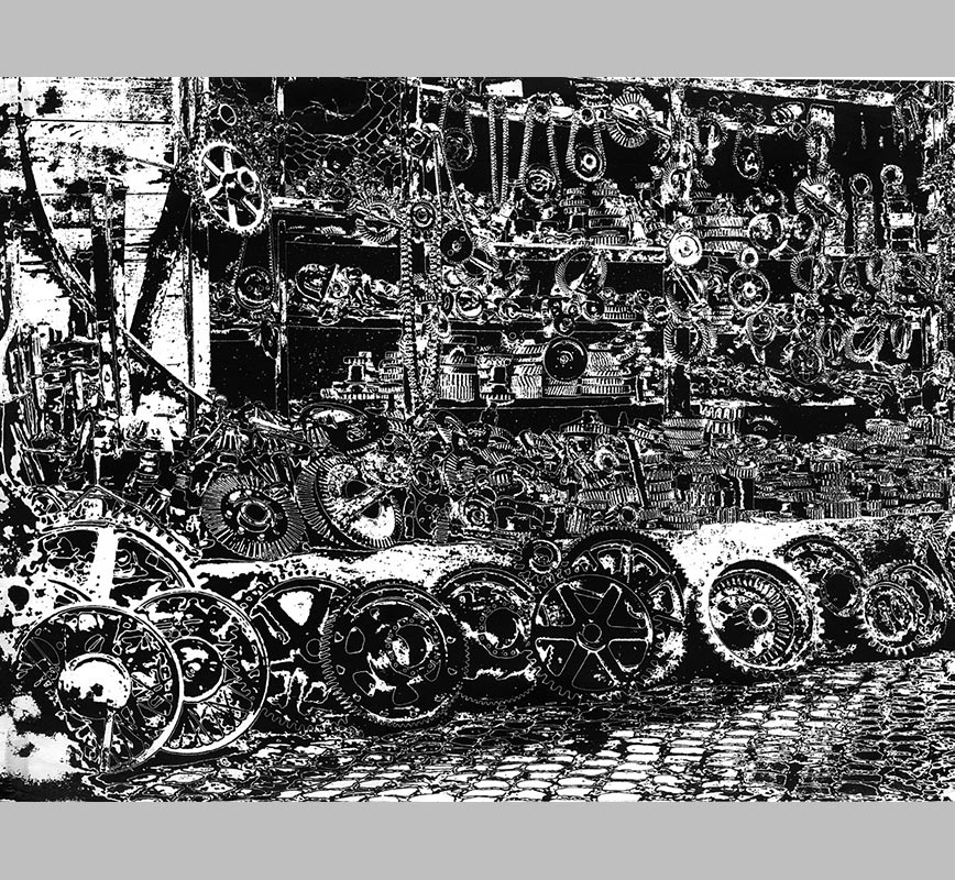 Pseudo-solarized black and white photograph of car wheels and gears at the Porta Portese market in Rome, Italy, in 1958. Limited edition print. Title: Wheels and Gears, Porta Portese, Rome, 1958