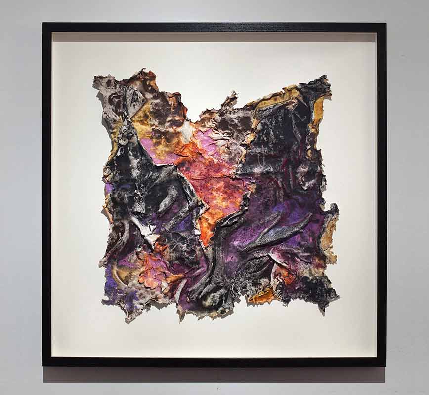 Framed abstract textural work on paper. Mainly purple colors. Title: Charta: Ater et Indicus