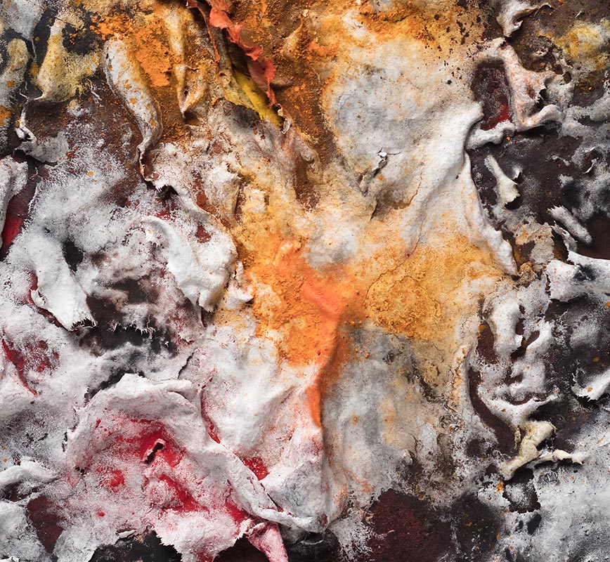 Detail of an abstract textural work on paper. Mainly orange and black colors. Title: Flammae Tenebrosae (Fires in the Darkness)