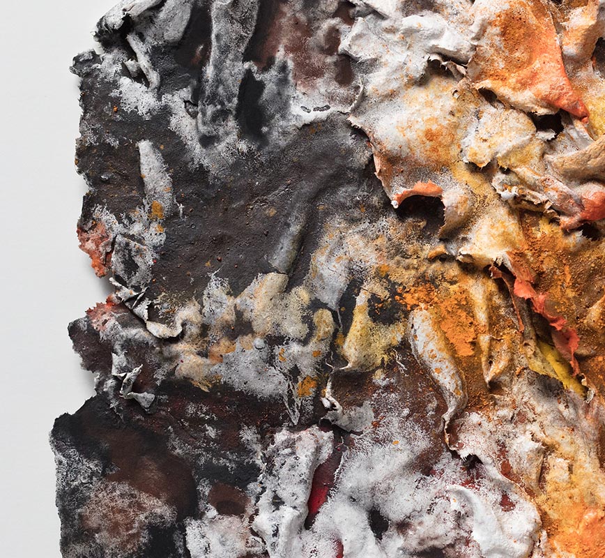 Detail of an abstract textural work on paper. Mainly orange and black colors. Title: Flammae Tenebrosae (Fires in the Darkness)